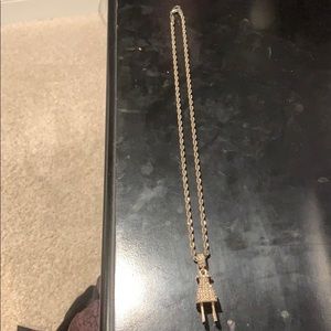 Gold chain with plug pendent